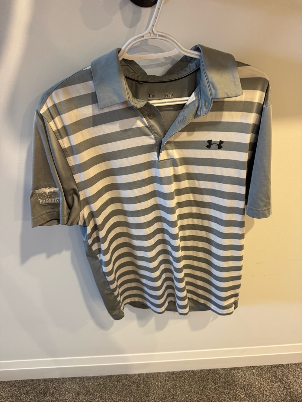 Under Armour polos and pullovers